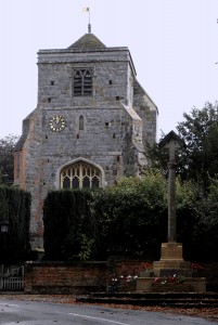 The First World War Memorial in Puttenham, with casualties from the Second added on a cartouche at the front 8 10 14
